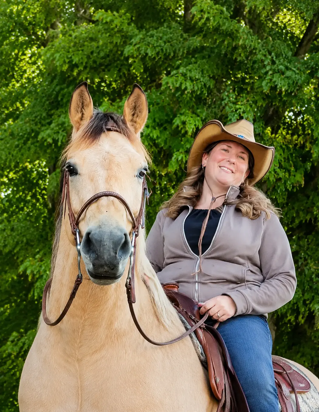 Easy Star Boarding owner and barn manager on horseback